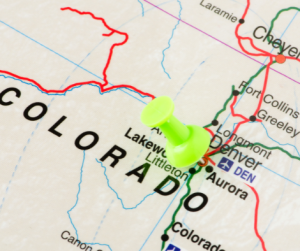 population in Colorado Springs and Denver Colorado